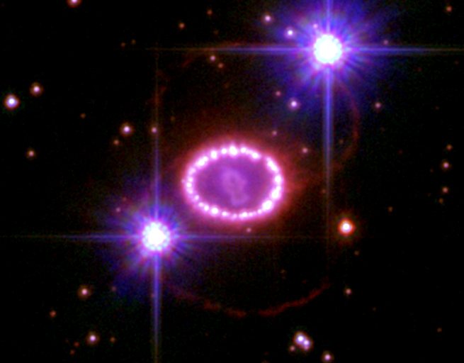 A glowing ring of gas around the debris of supernova 1987A